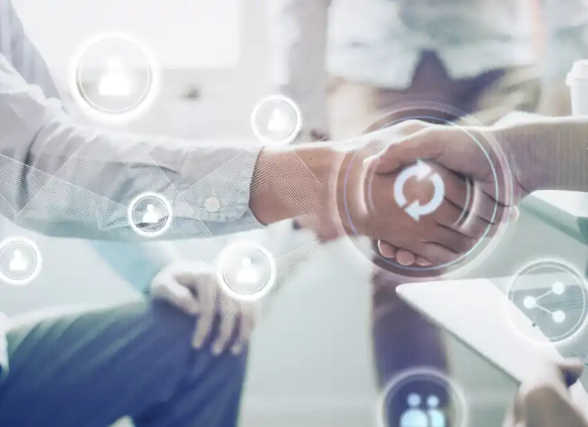 握手を交わすビジネスマンの手と、ユーザーアイコンが散りばめられたサポートネットワークのイメージ